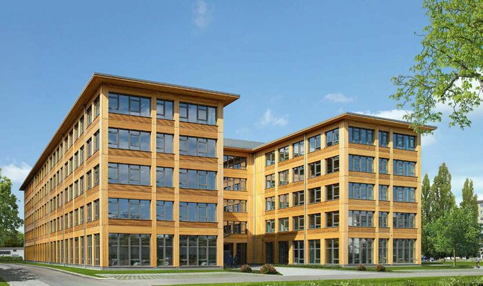 Das fünfgeschossige Bürogebäude in Holzbauweise in Berlin-Marzahn ist eines von mehreren baugleichen Häusern und wurde im Herbst 2021 fertiggestellt. Neben der nachhaltigen Bauweise und den ökologischen Materialien sind die 10.000 m2 Holzdecken-Elemente mit Hohlbodenaufbau ein Novum, die zusammen für guten Schallschutz sorgen.